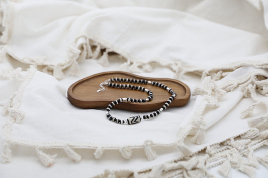 The Ancient Wisdom Necklace by Gaia's Heirlooms, made with black and white Tibetan Agates and Sterling Silver.