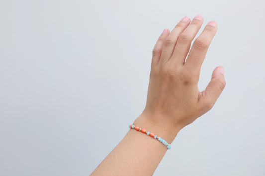 Bracelet handmade with Amazonines, salmon-coloured Bamboo Corals and Gold Filled details.