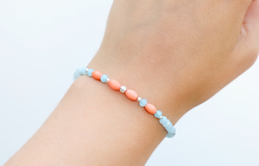 Bracelet handmade with Amazonines, salmon-coloured Bamboo Corals and Sterling Silver details.