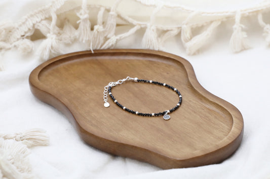 The Radiant Guardian Bracelet by Gaia's Heirlooms, made with tiny Black Spinel beads and Sterling Silver.