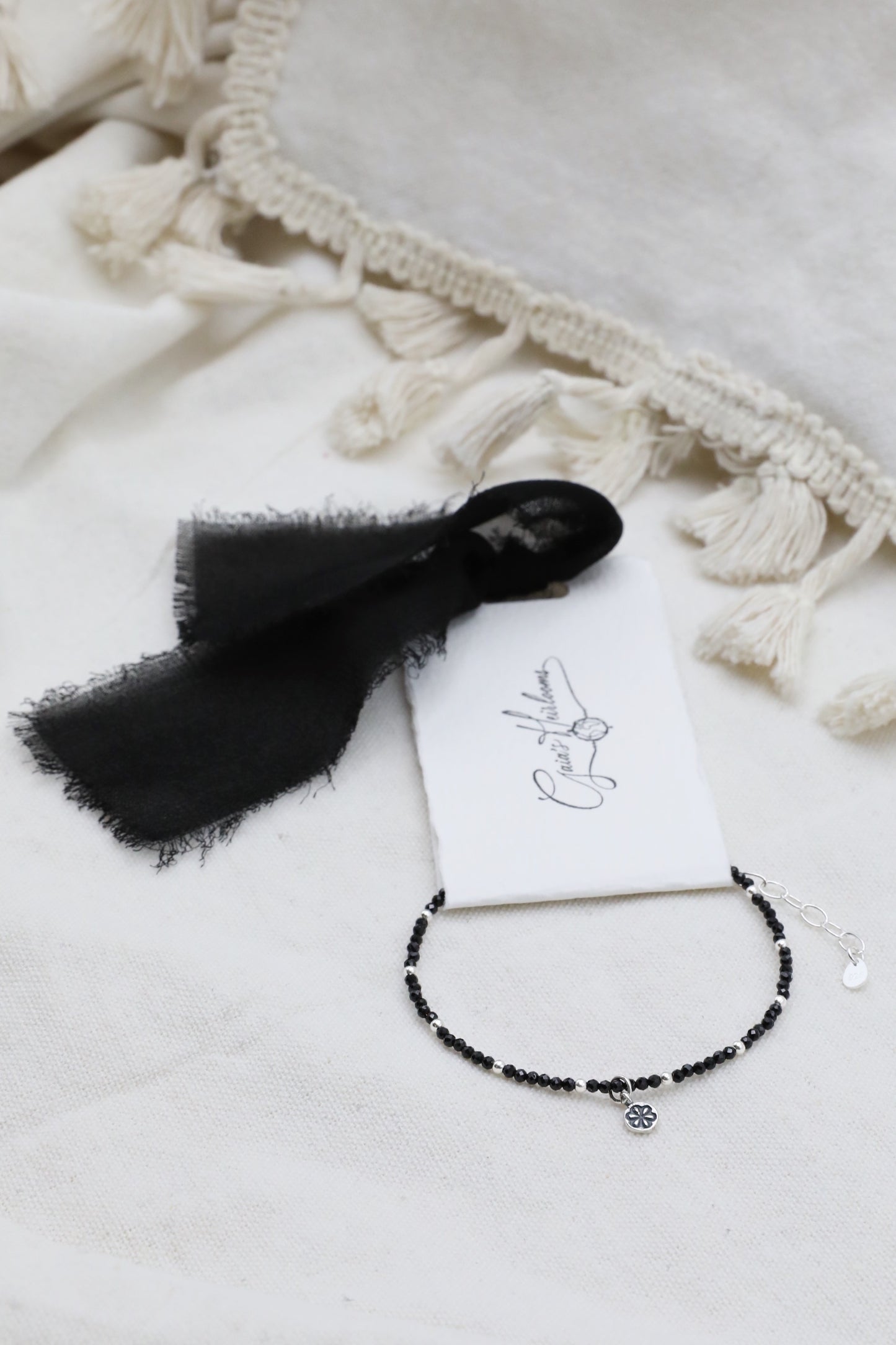 The Radiant Guardian Bracelet by Gaia's Heirlooms, made with tiny Black Spinel beads and Sterling Silver.