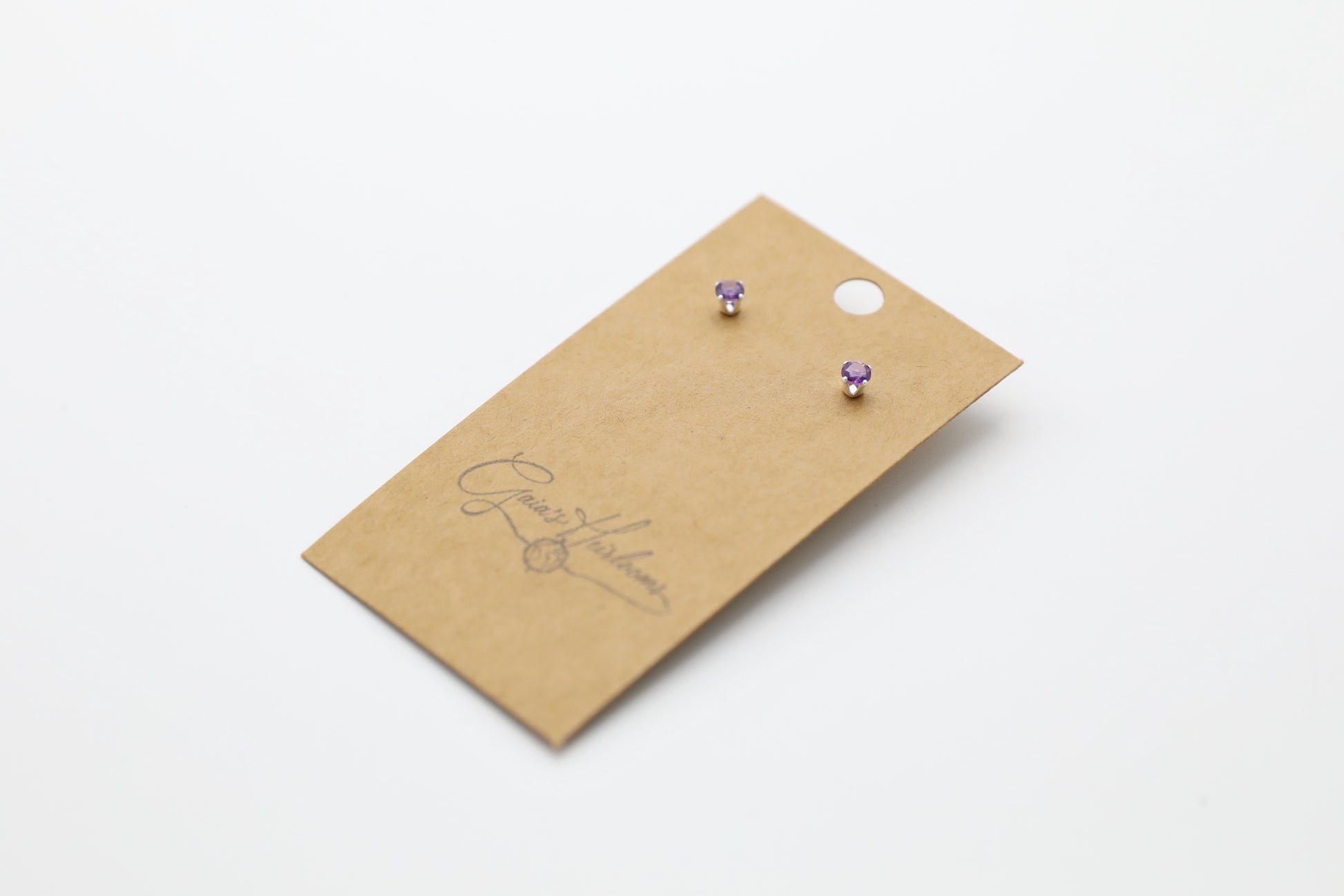 Pair of Amethyst stud earrings in Sterling Silver.
Size: 4mm