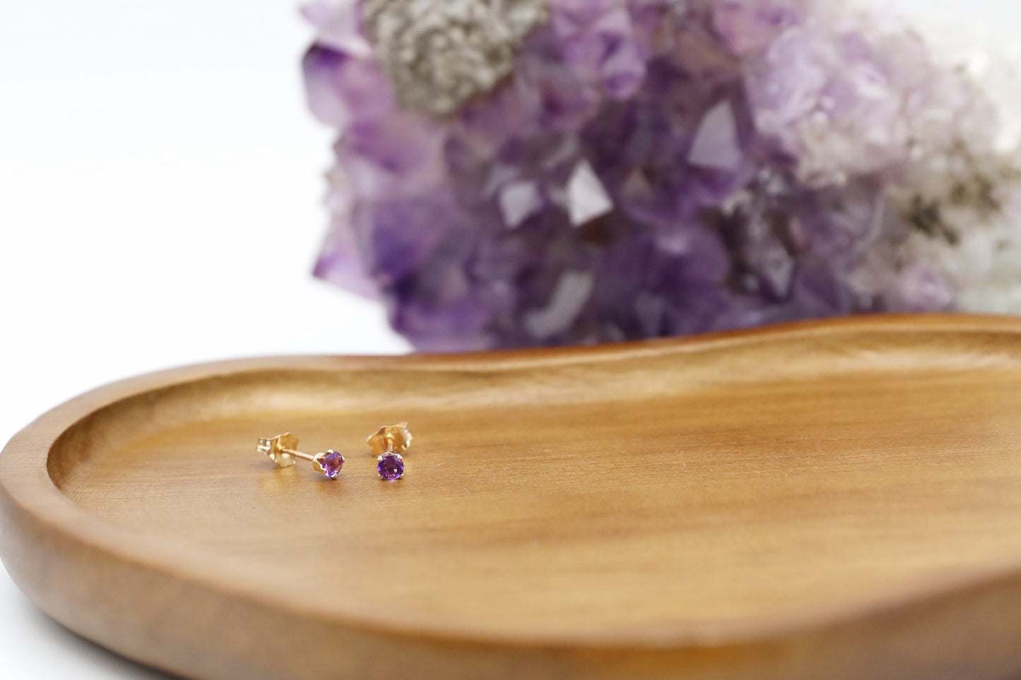 Pair of Amethyst stud earrings in Gold Filled.
Size: 4mm