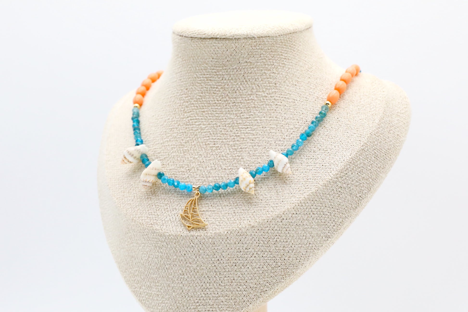 Blue Apatite, Salmon Bamboo and Seashell Necklace with a Gold Filled Boat Pendant