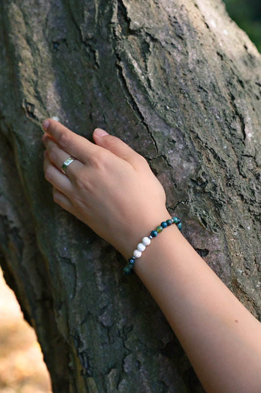 The Forest Floor Bracelet by Gaia's Heirlooms, made with Moss Agate and three Howlite beads, finished with oxidised Sterling Silver details.