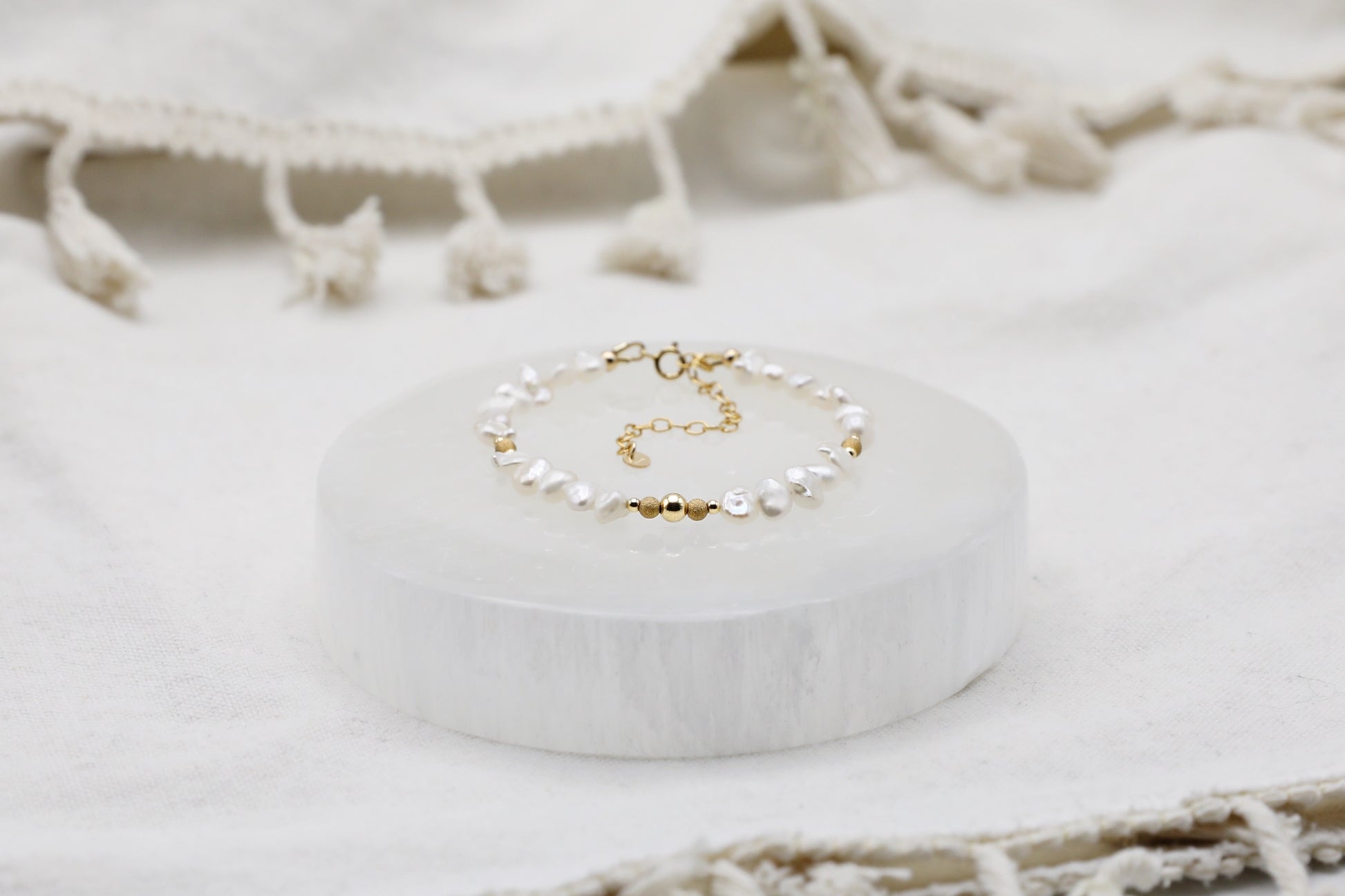 Mother of Pearl bracelet with Gold Filled details.