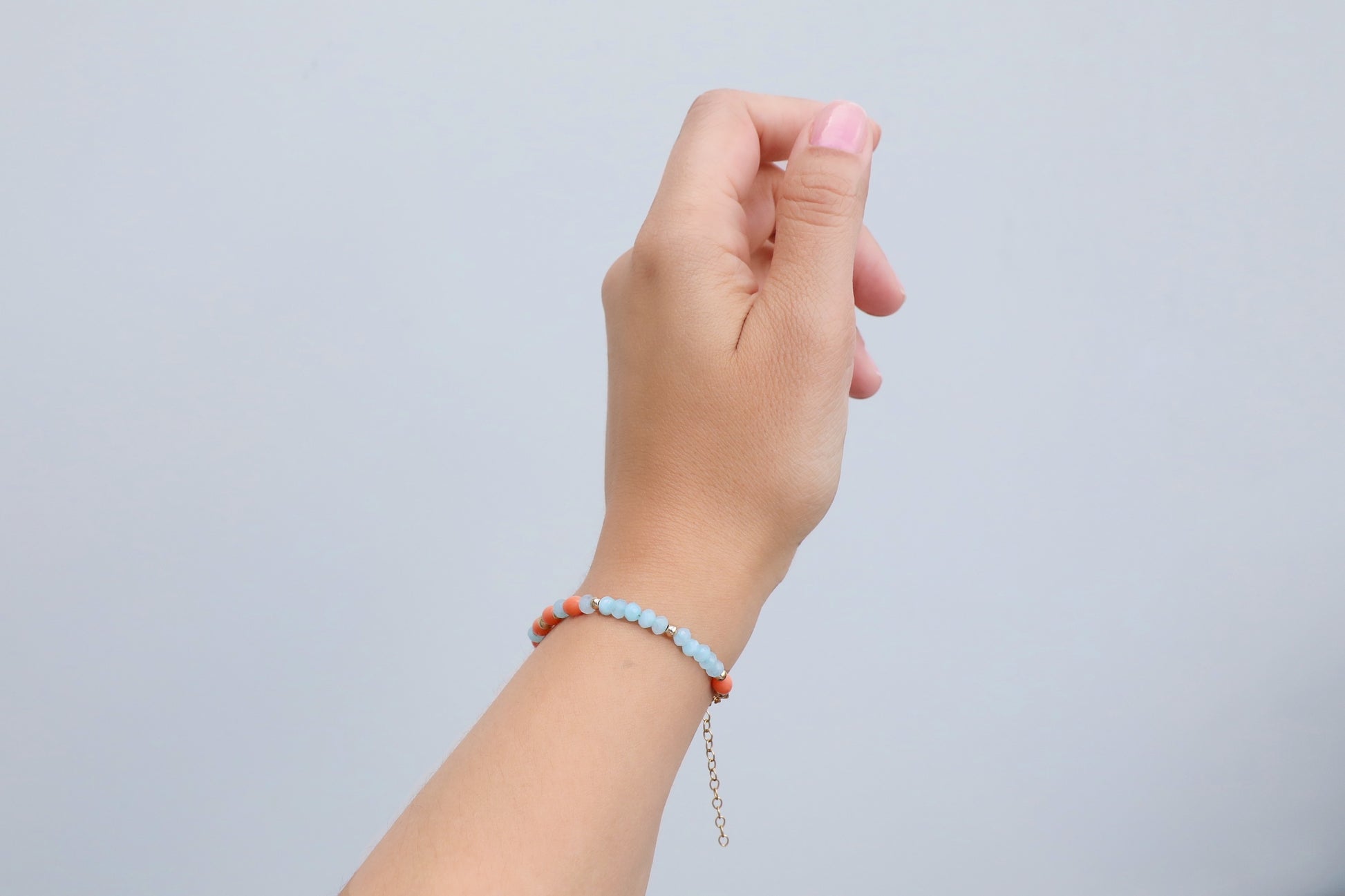 Bracelet handmade with Amazonines, salmon-coloured Bamboo Corals and Gold Filled details.