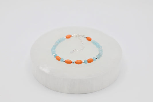 Bracelet handmade with Amazonines, salmon-coloured Bamboo Corals and Sterling Silver details.