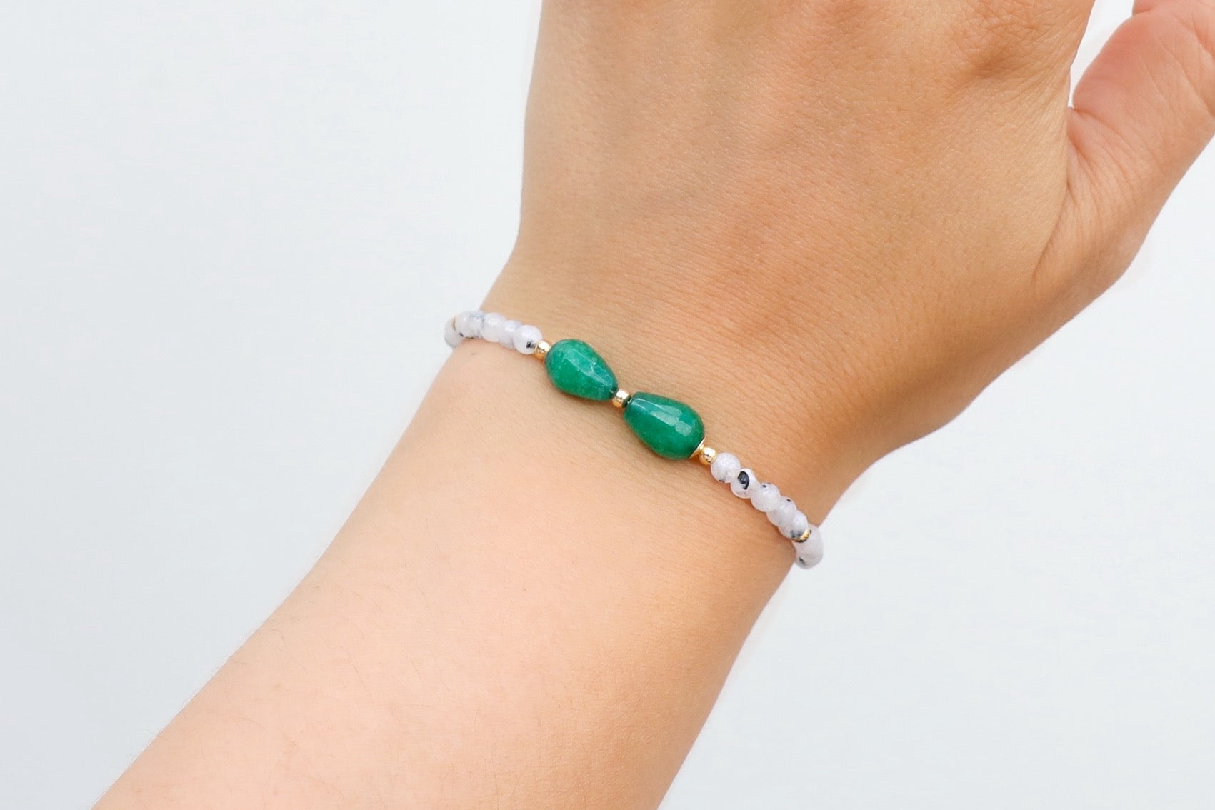 Moonstone, black tourmaline and green jade bracelet with gold filled accents.