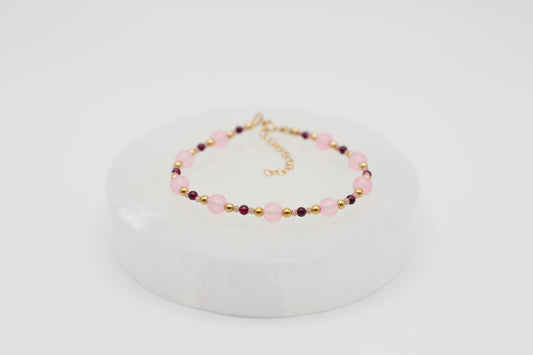 Bracelet made with 6mm Rose Quartz, 3mm Garnet and tiny 2mm Rhodochrosite beads, and Gold Filled details.