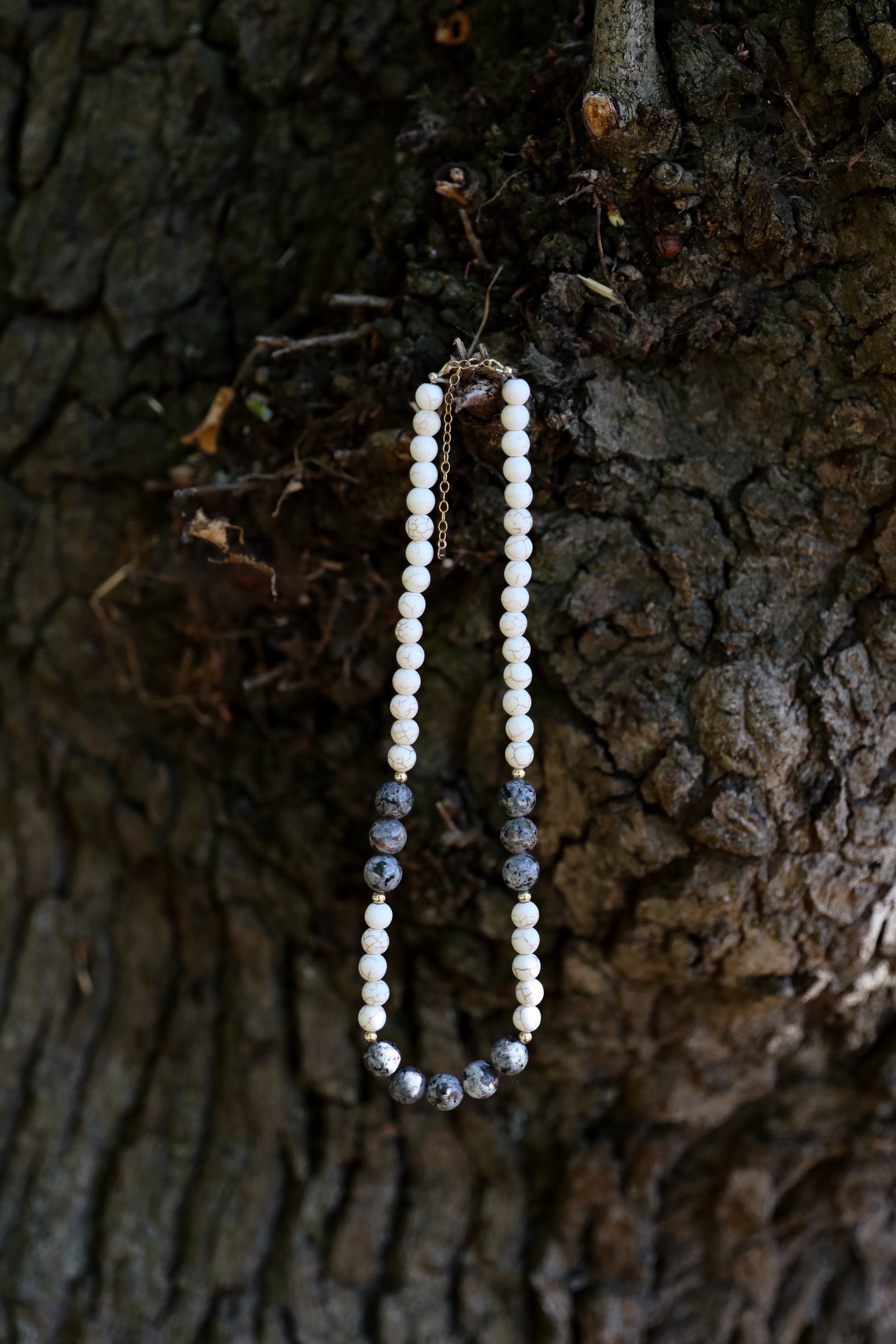 The Inner Fire Necklace by Gaia's Heirlooms, made with Howlite and Flame Stone large beads, finished with Gold Filled details.