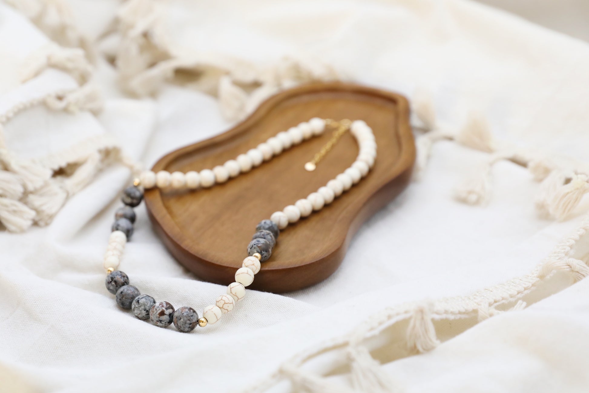 The Inner Fire Necklace by Gaia's Heirlooms, made with Howlite and Flame Stone large beads, finished with Gold Filled details.