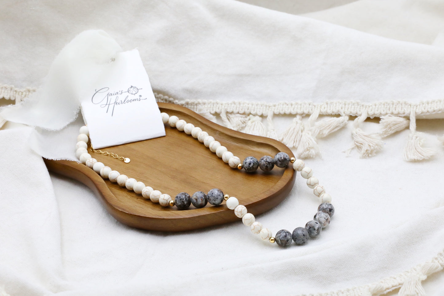 The Inner Fire Necklace by Gaia's Heirlooms, made with Howlite and Flame Stone large beads, finished with Gold Filled details.