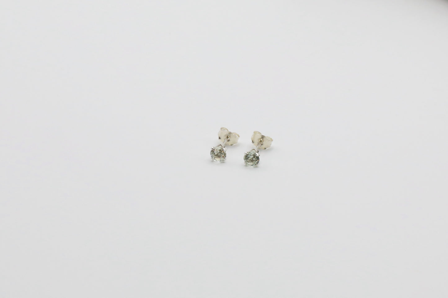 Pair of Light Green Amethyst stud earrings in Sterling Silver.
Size: 4mm