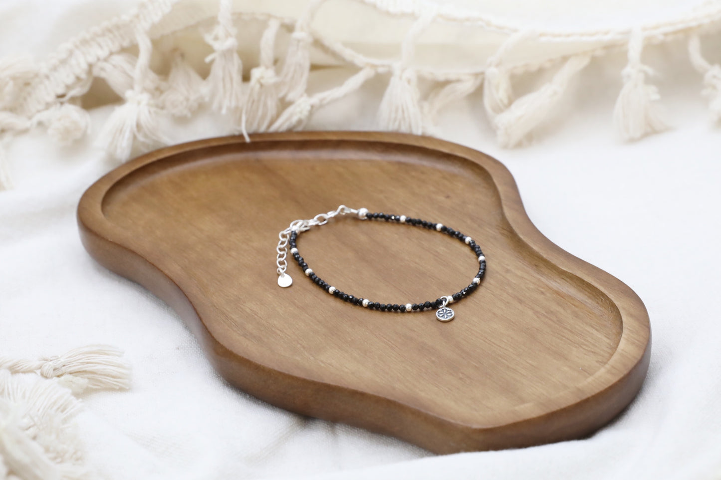 The Radiant Guardian Bracelet by Gaia's Heirlooms, made with tiny Black Spinel beads and Sterling Silver.