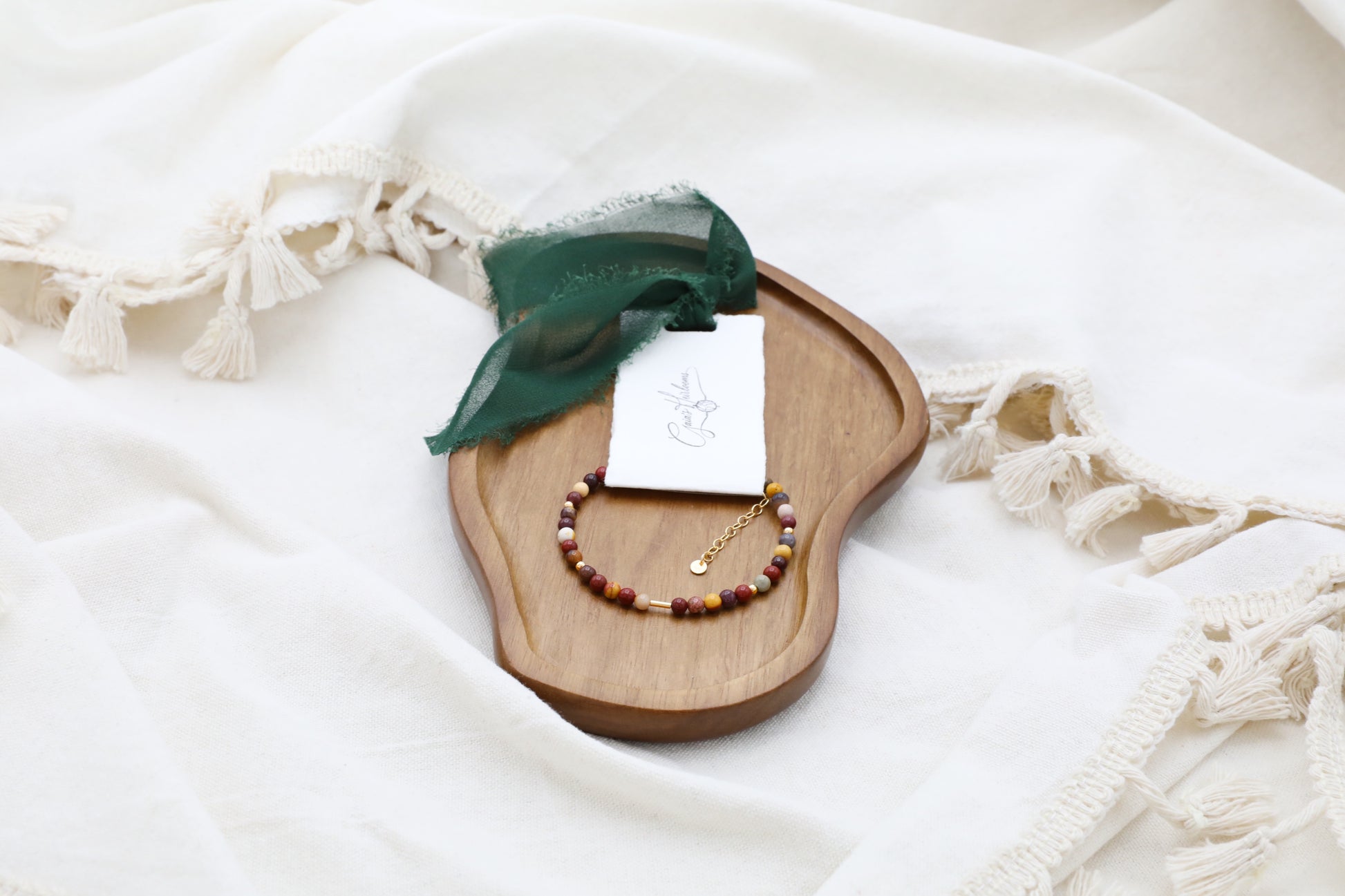 The Resilient Heart Bracelet by Gaia's Heirlooms, made with Mookaite beads and Gold Filled details.