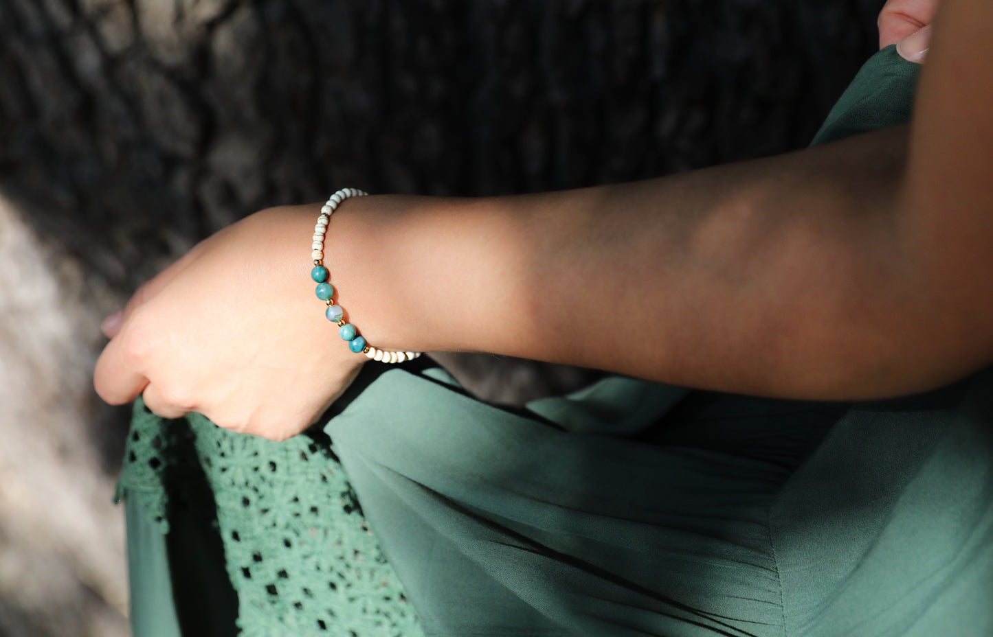 The Stillness Bracelet by Gaia's Heirlooms, made with Howlite and Moss Agate beads, finished with Gold Filled details.